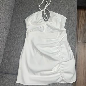 White halter neck dress with mid section cut out